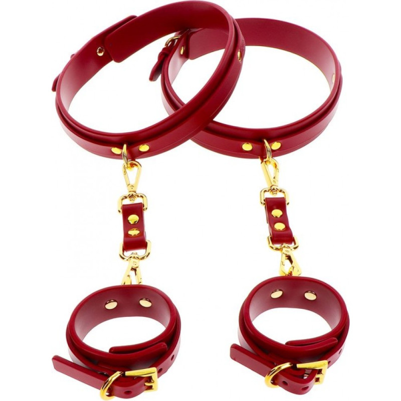 Фіксатори на стегна з наручниками та карабінами Taboom, червоні, із золотистою фурнітурою Фіксатори на стегна з наручниками та карабінами Taboom, червоні, із золотистою фурнітурою