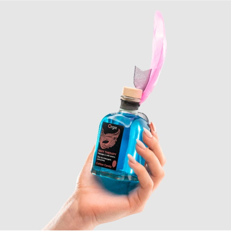 Набір: їстівна масажна олія + перо ЦУКРОВА ВАТА Orgie 100 мл Набір: їстівна масажна олія + перо ЦУКРОВА ВАТА Orgie 100 мл